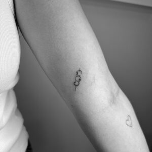 Tatuaje pequeño palillo aceitunas